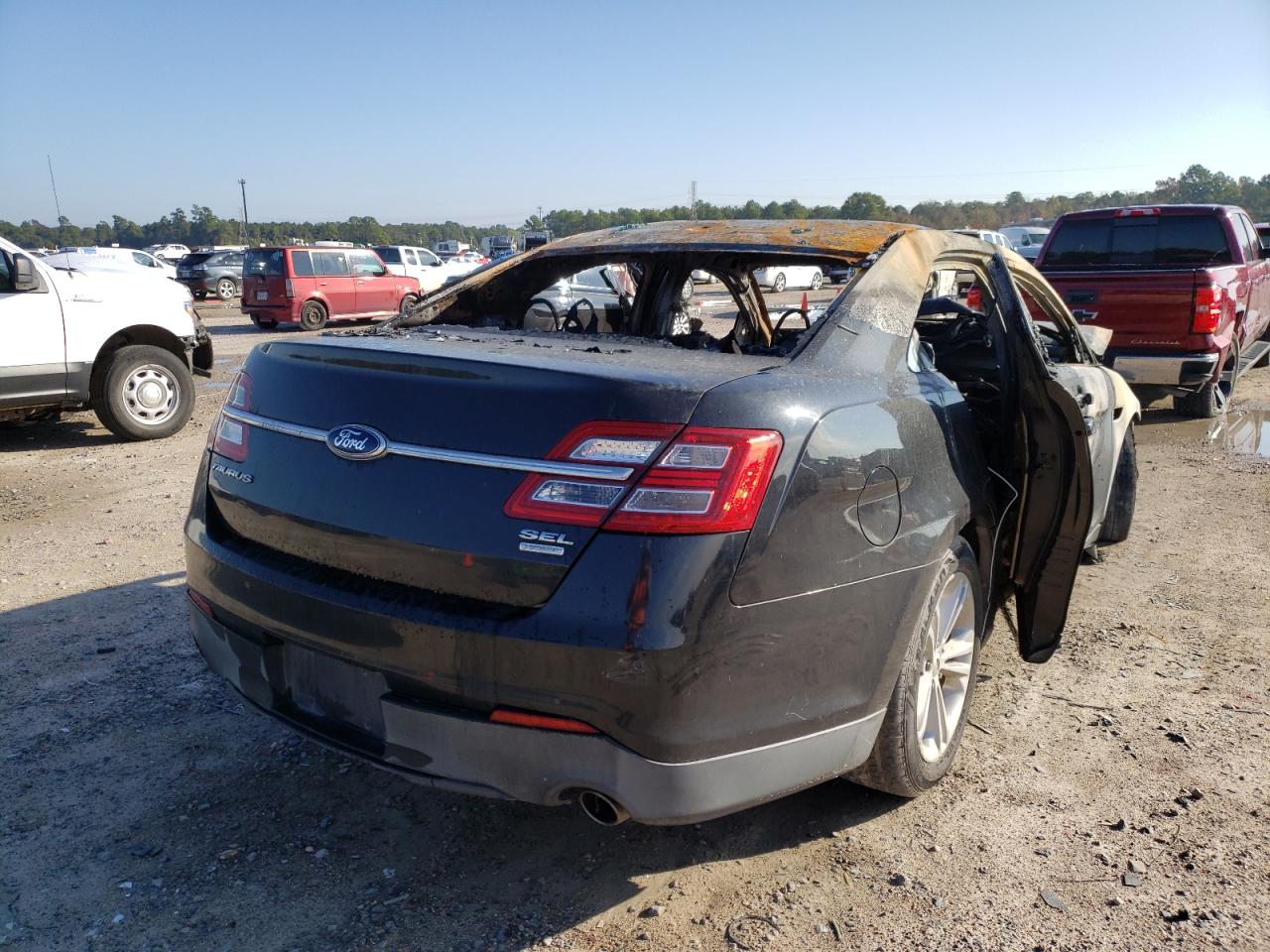 Photo 4 from auction – 2013 FORD TAURUS SEL with VIN 1FAHP2E91DG230666