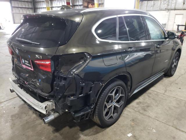 Photo 4 from auction – 2017 BMW X1 XDRIVE2 with VIN WBXHT3C31H5F81711