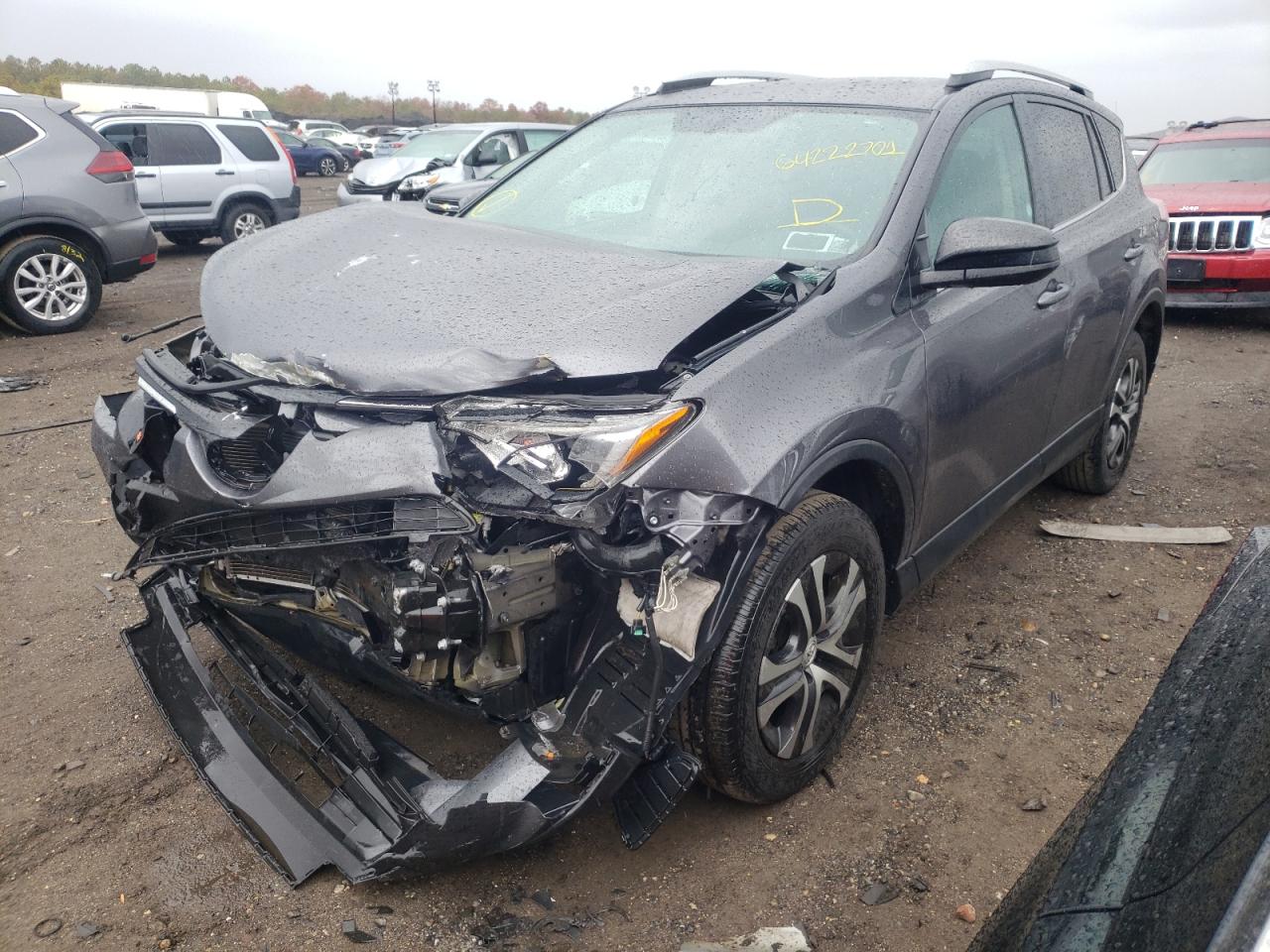 Photo 2 from auction – 2016 TOYOTA RAV4 LE with VIN 2T3BFREV7GW482892