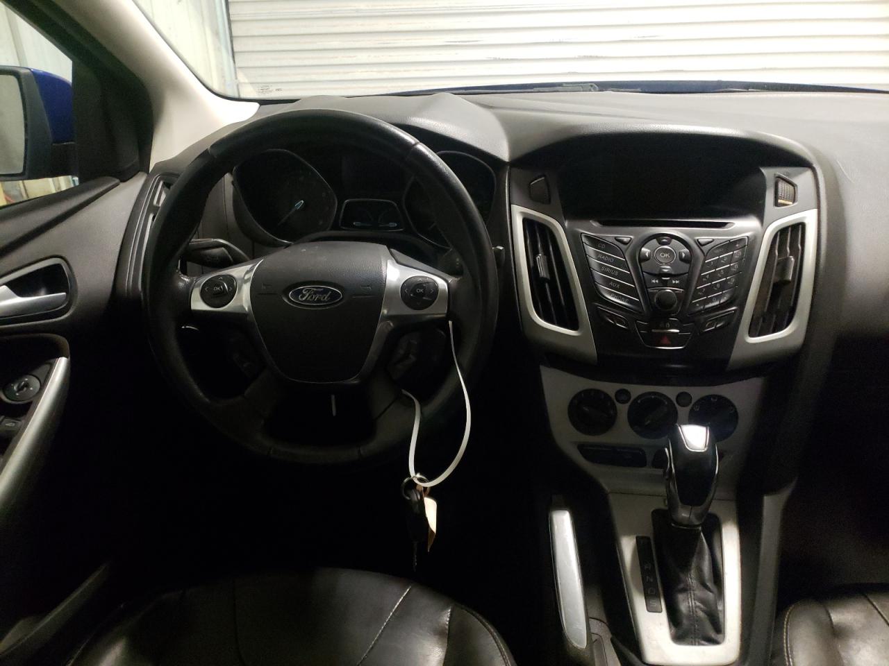 Photo 9 from auction – 2013 FORD FOCUS SE with VIN 1FADP3F23DL124863