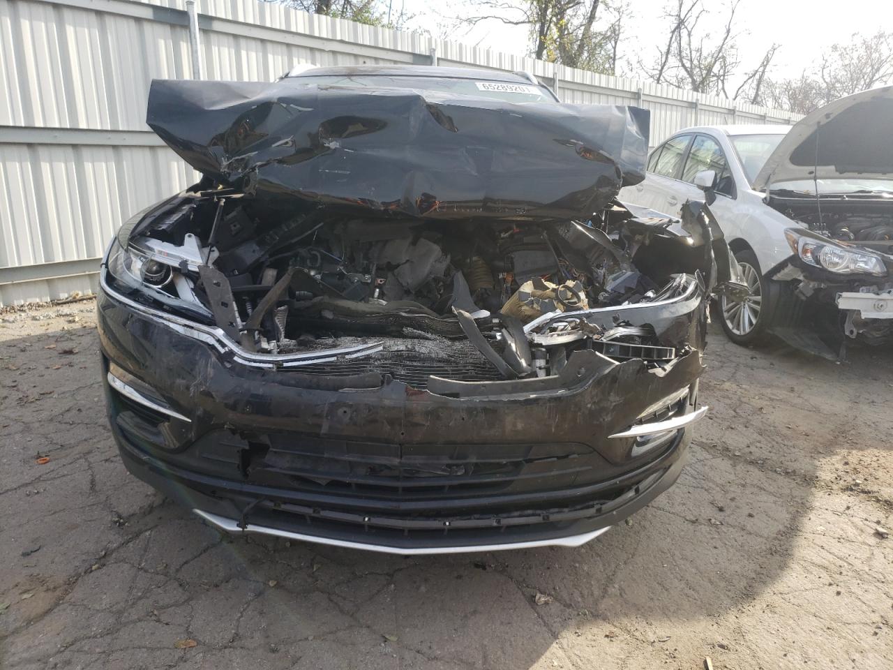 Photo 9 from auction – 2017 LINCOLN MKC RESERV with VIN 5LMCJ3D90HUL16516