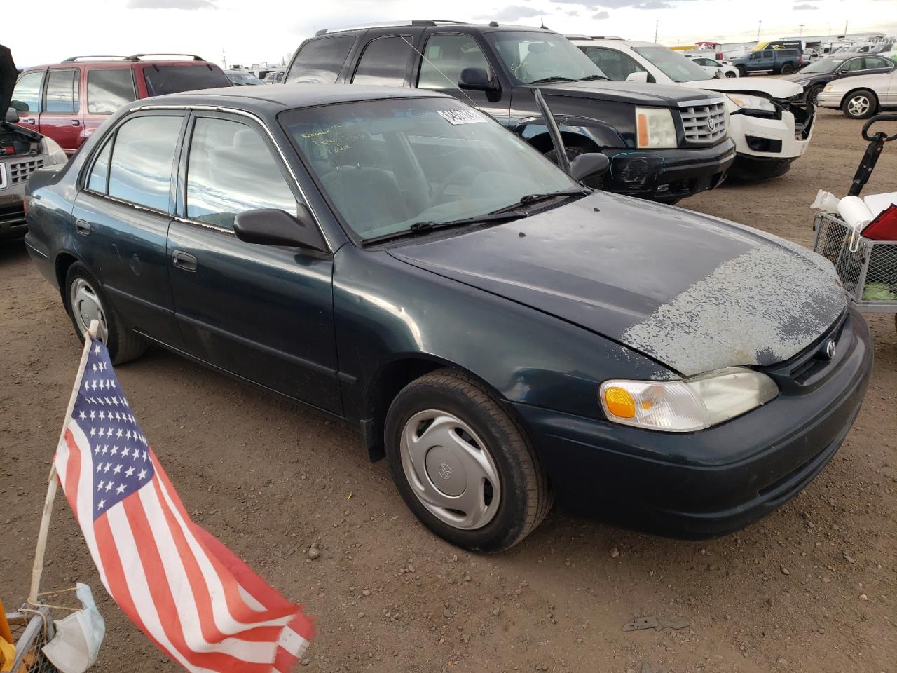 TOYOTA COROLLA 1999 with VIN 2T1BR12E9XC152937 - Photo from auction