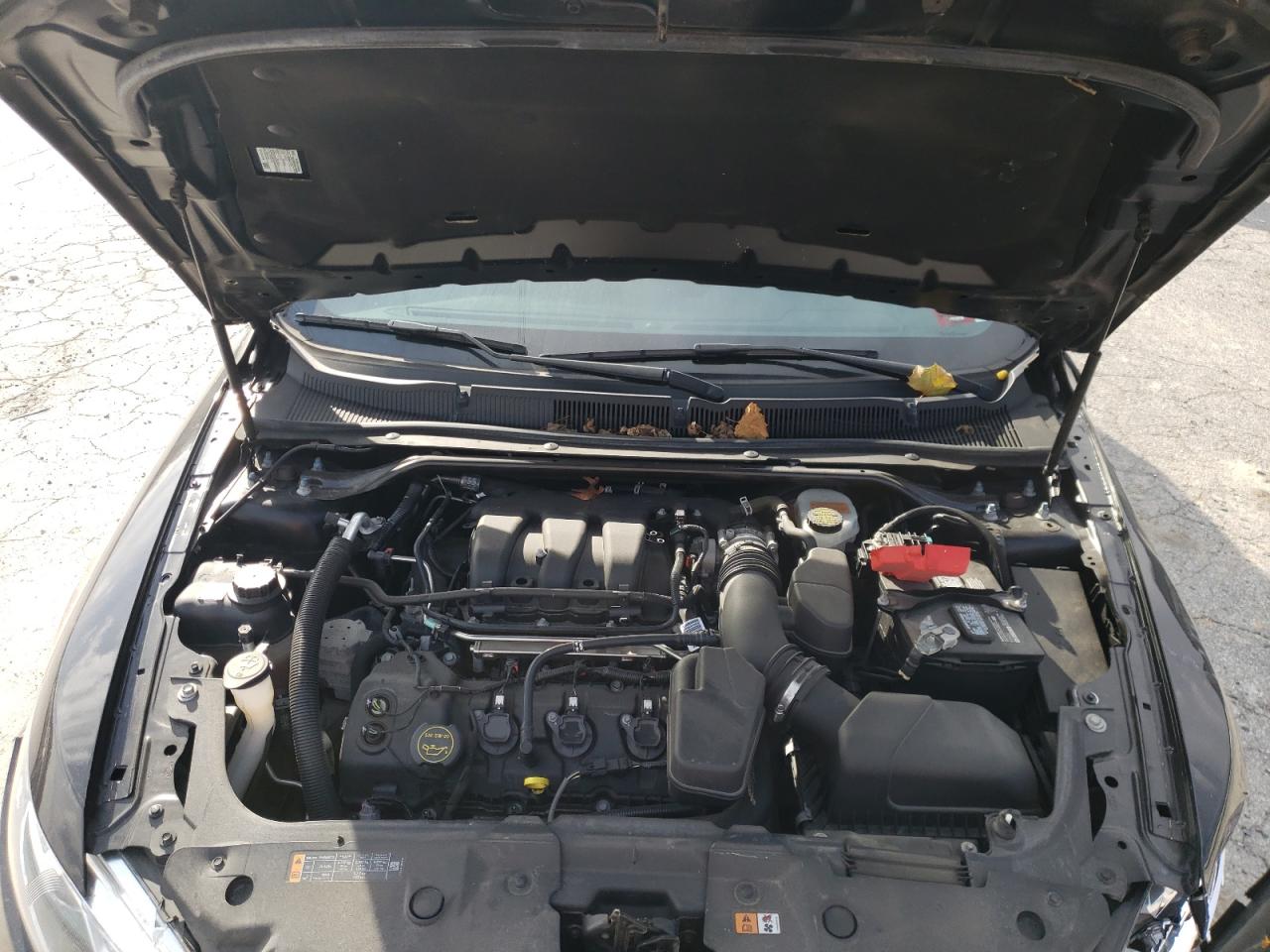Photo 7 from auction – 2018 FORD TAURUS SEL with VIN 1FAHP2E80JG103362