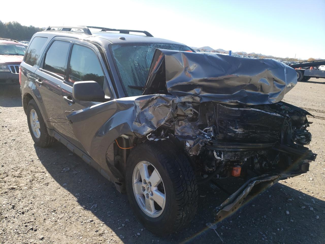 FORD ESCAPE XLT 2009 with VIN 1FMCU03789KC98899 - Photo from auction