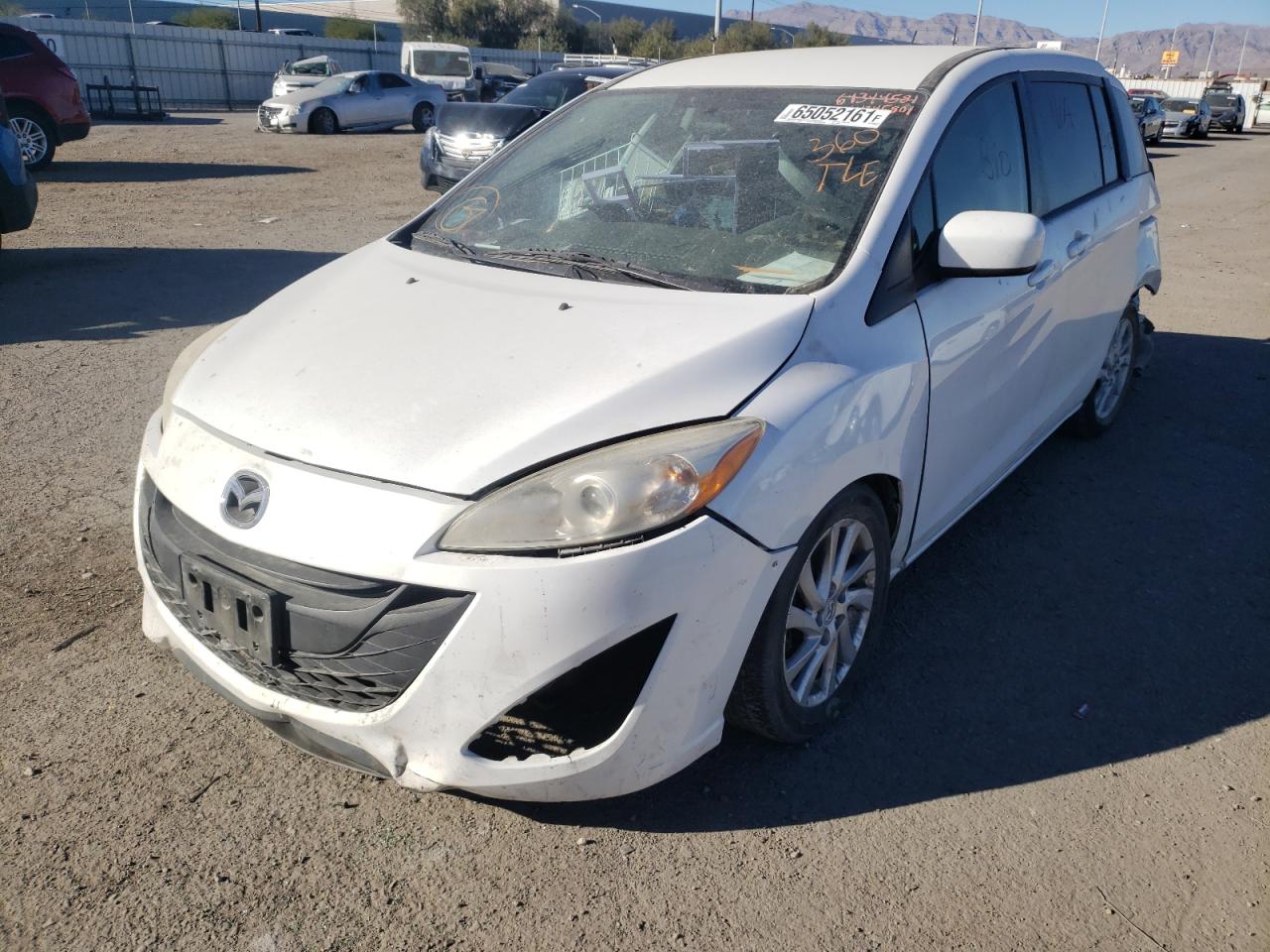 Photo 2 from auction – 2012 MAZDA 5 with VIN JM1CW2BL6C0101398