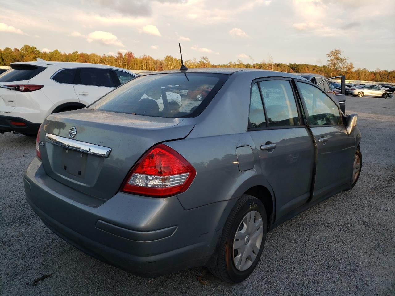 Photo 4 from auction – 2010 NISSAN VERSA S with VIN 3N1BC1AP3AL377253