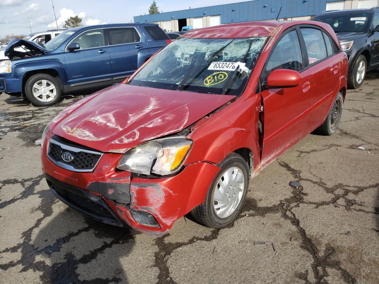 Photo 2 from auction – 2011 KIA RIO BASE with VIN KNADH5A35B6748210