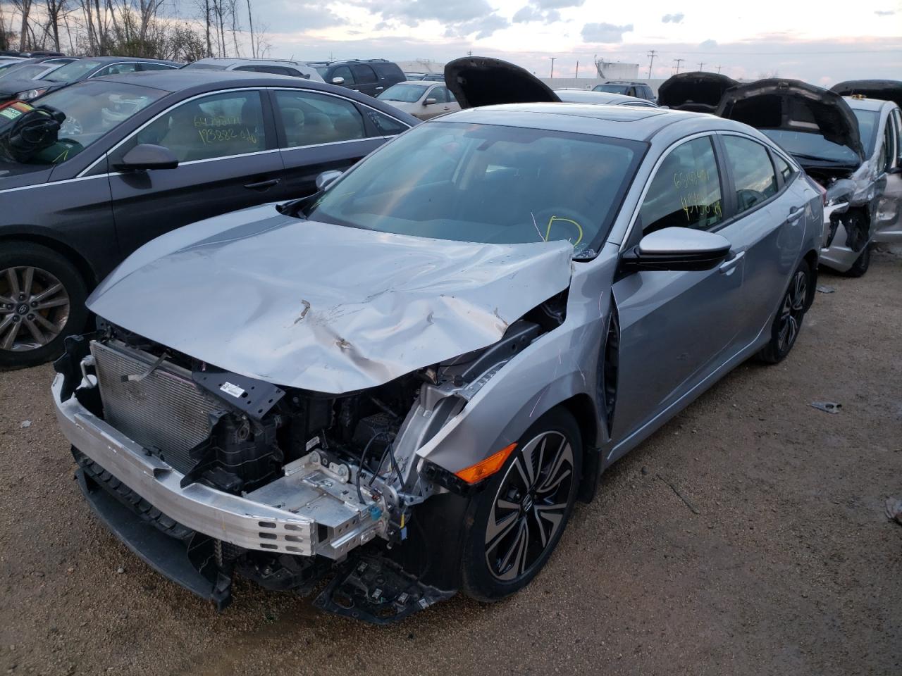 Photo 2 from auction – 2018 HONDA CIVIC EX with VIN JHMFC1F34JX030926