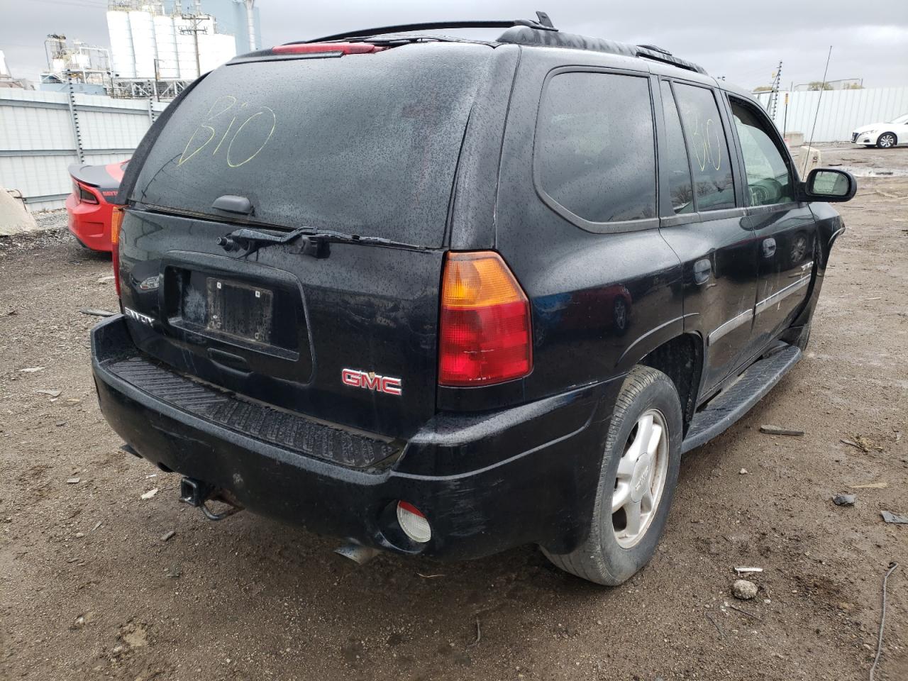 Photo 4 from auction – 2006 GMC ENVOY with VIN 1GKDS13S062111387