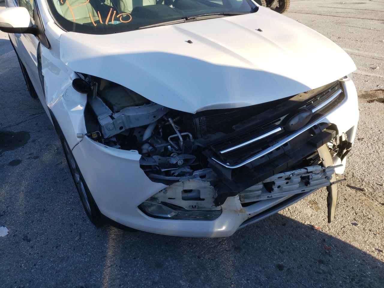Photo 9 from auction – 2015 FORD ESCAPE TIT with VIN 1FMCU9J98FUC29154
