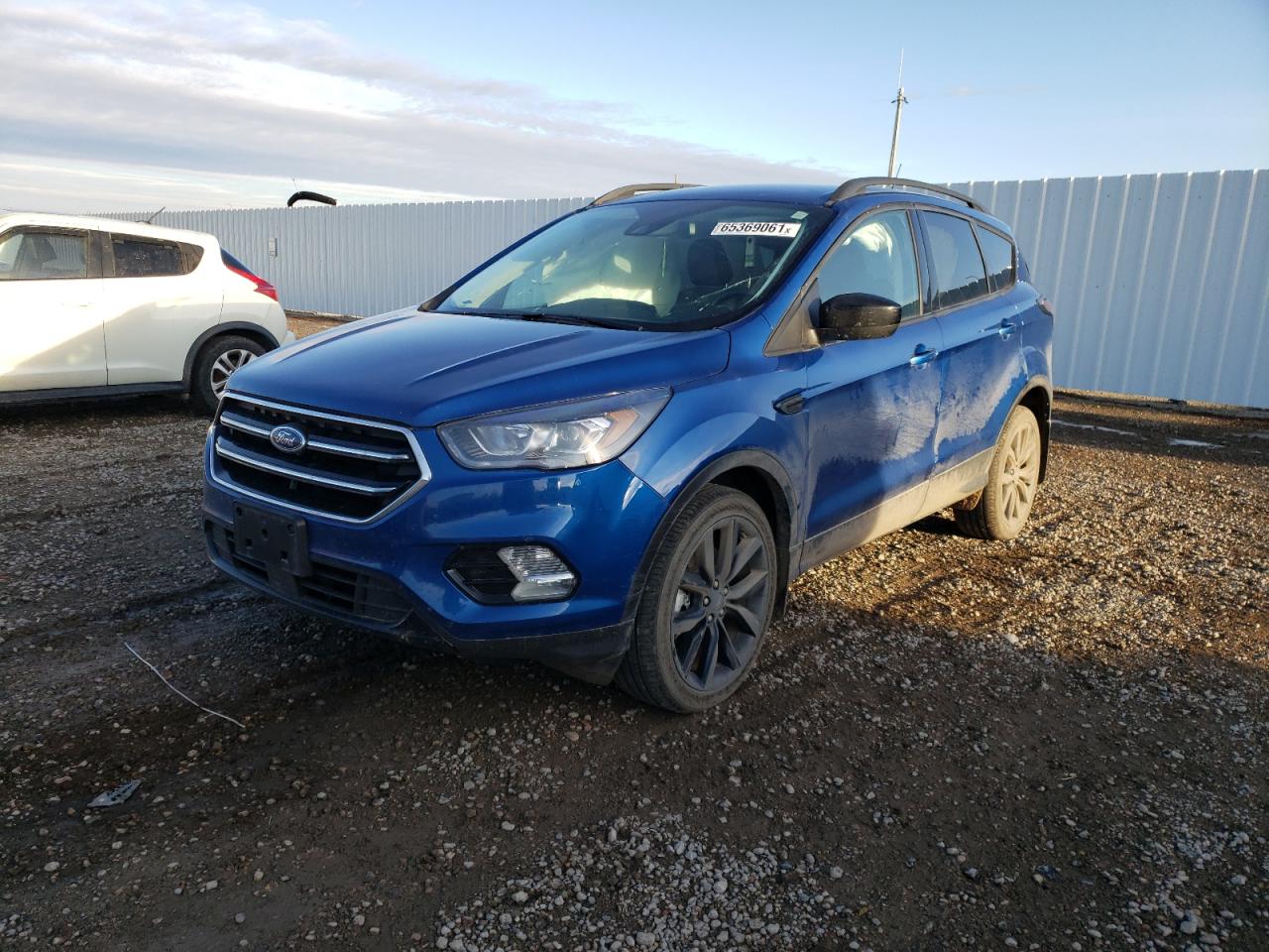 Photo 2 from auction – 2018 FORD ESCAPE SE with VIN 1FMCU9GD9JUC10472