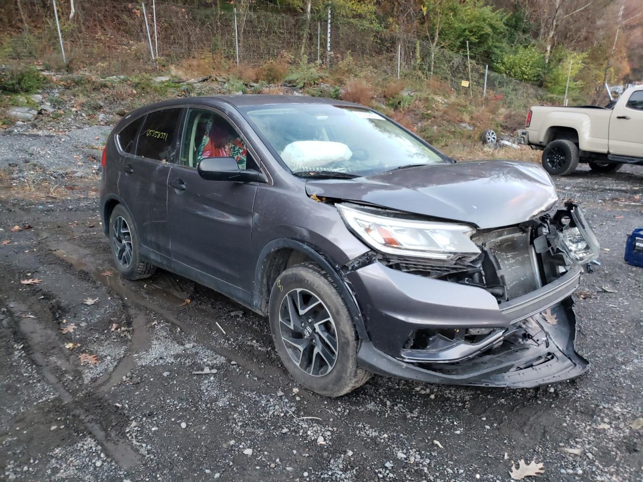 HONDA CR-V SE 2016 with VIN 2HKRM4H4XGH697913 - Photo from auction