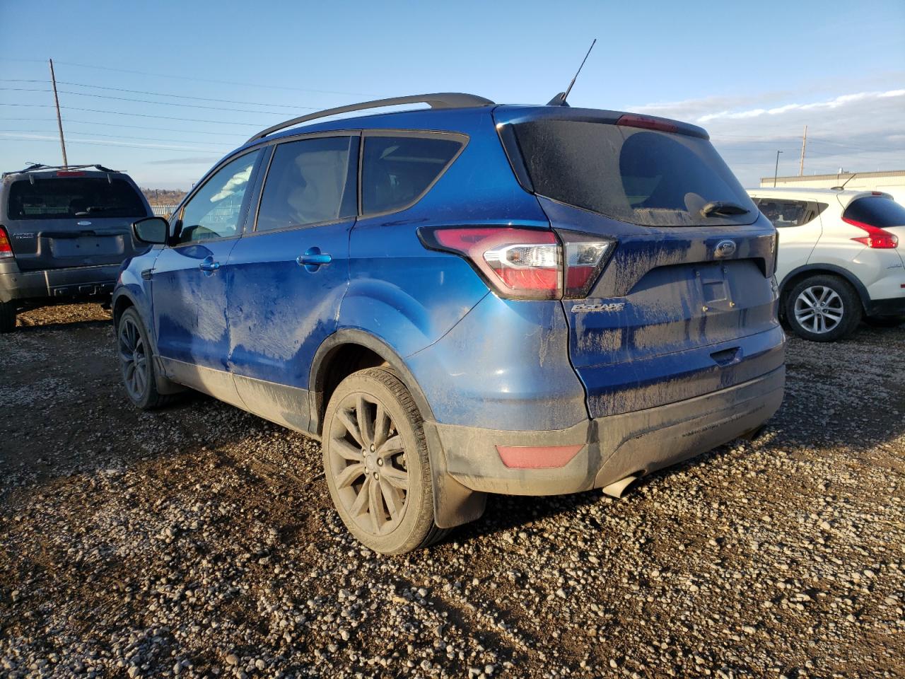 Photo 3 from auction – 2018 FORD ESCAPE SE with VIN 1FMCU9GD9JUC10472