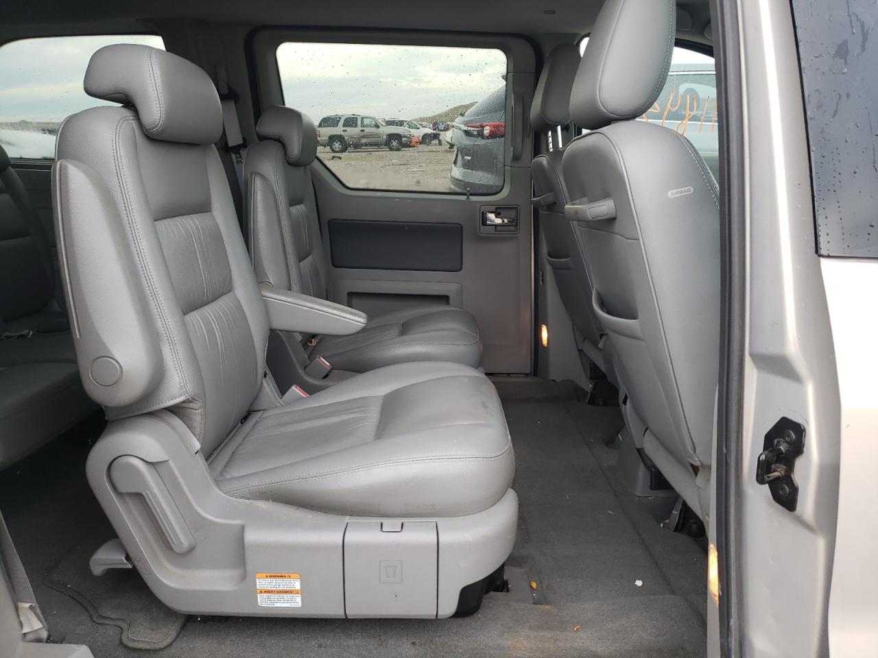 Photo 6 from auction – 2006 FORD FREESTAR L with VIN 2FMDA582X6BA33253