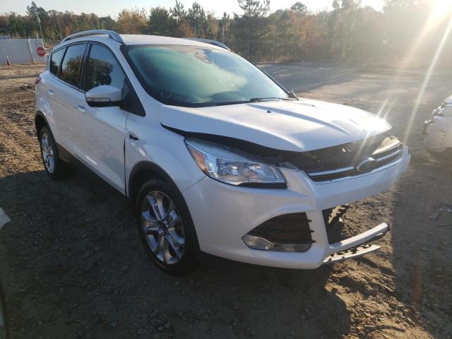 FORD ESCAPE TIT 2016 with VIN 1FMCU9J95GUA77612 - Photo from auction
