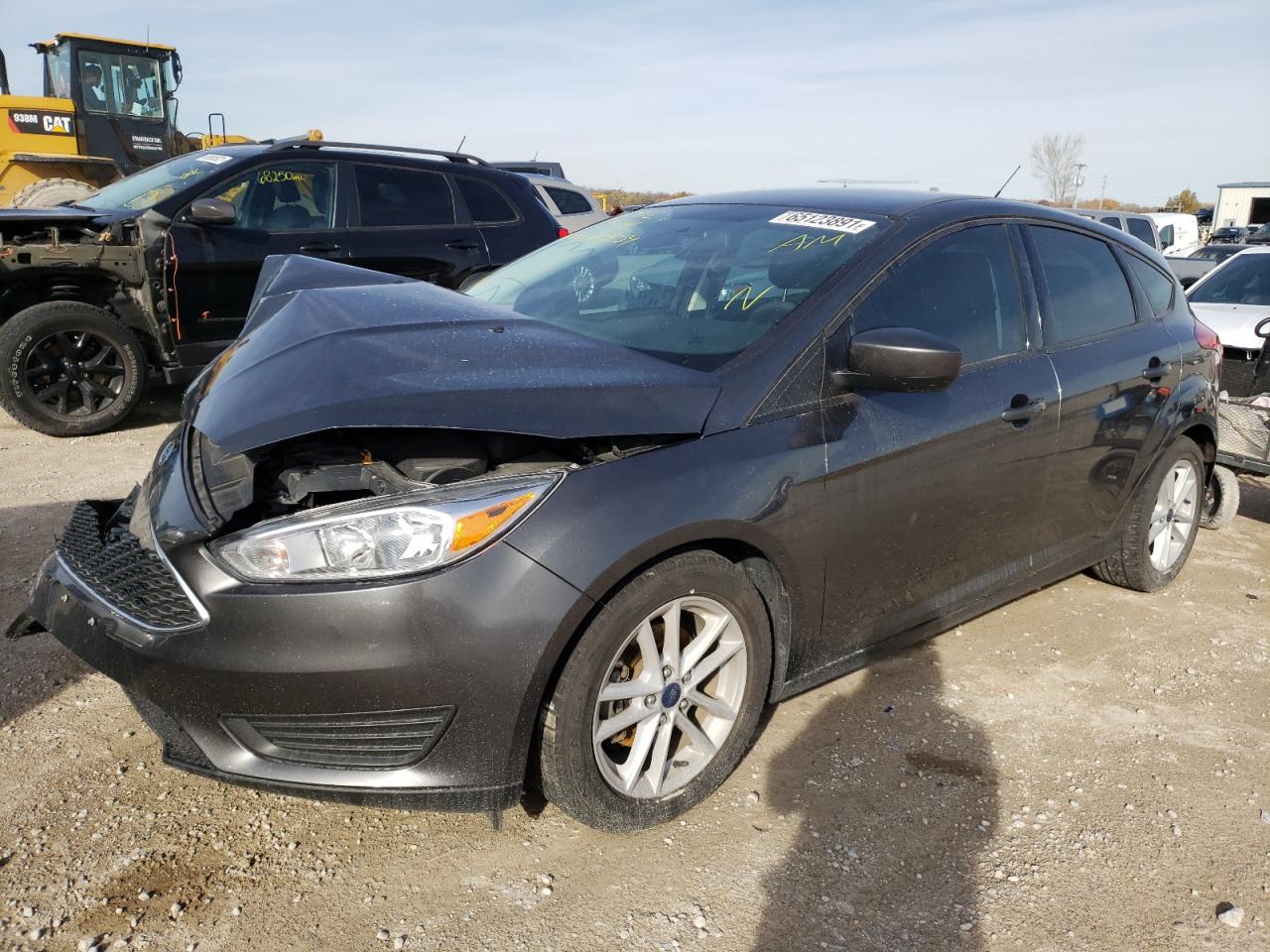 Photo 2 from auction – 2018 FORD FOCUS SE with VIN 1FADP3K27JL277859