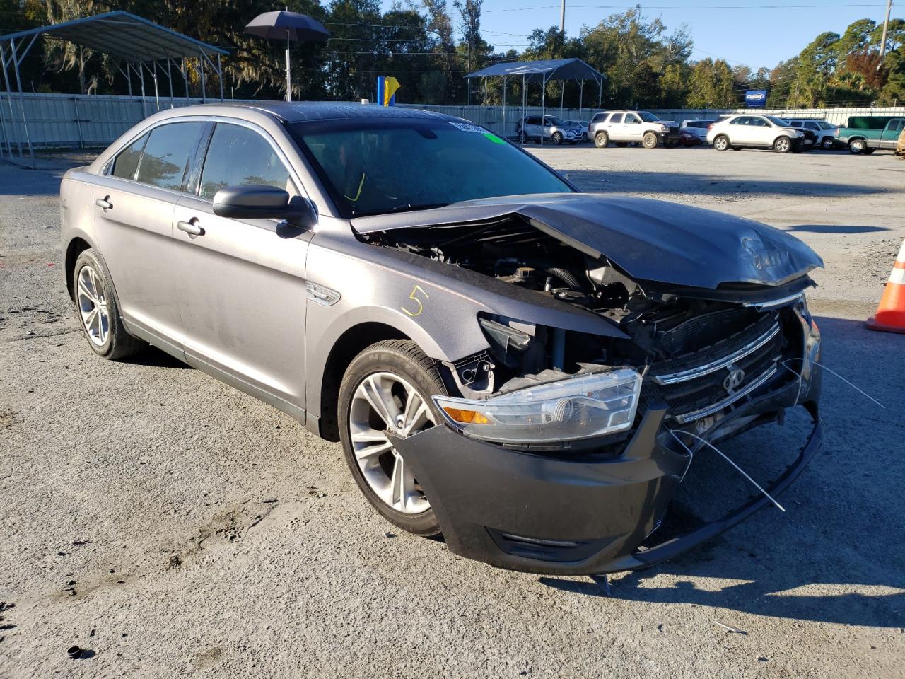 FORD TAURUS SEL 2013 with VIN 1FAHP2E87DG170979 - Photo from auction