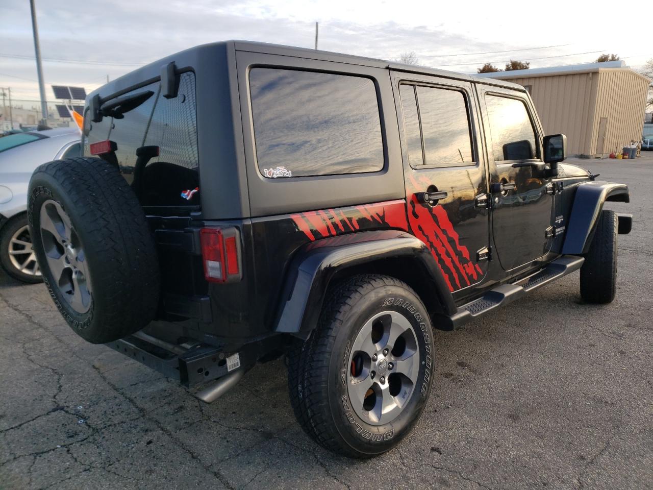 Photo 4 from auction – 2016 JEEP WRANGLER U with VIN 1C4BJWEG2GL323201