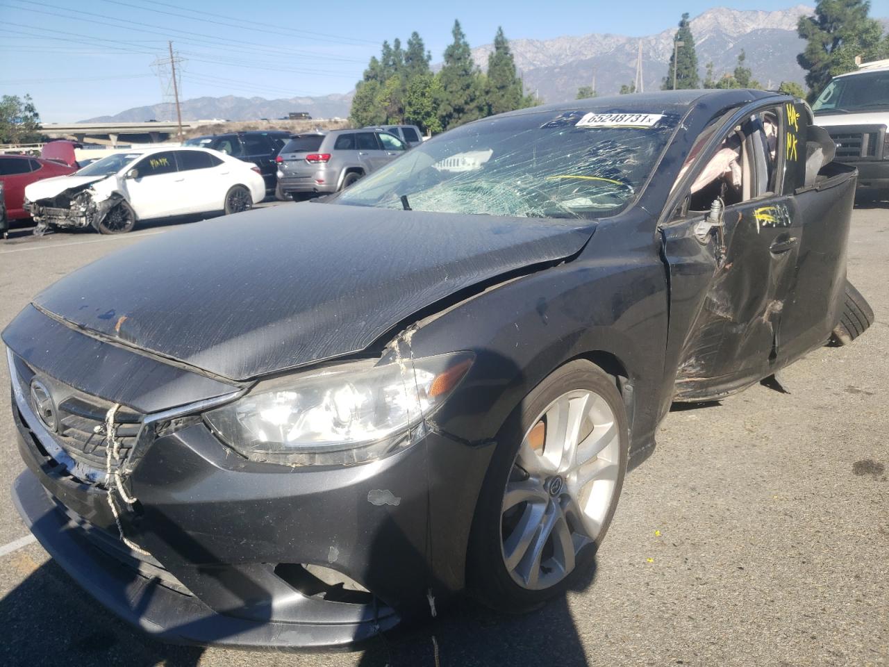 Photo 2 from auction – 2014 MAZDA 6 TOURING with VIN JM1GJ1V61E1147346