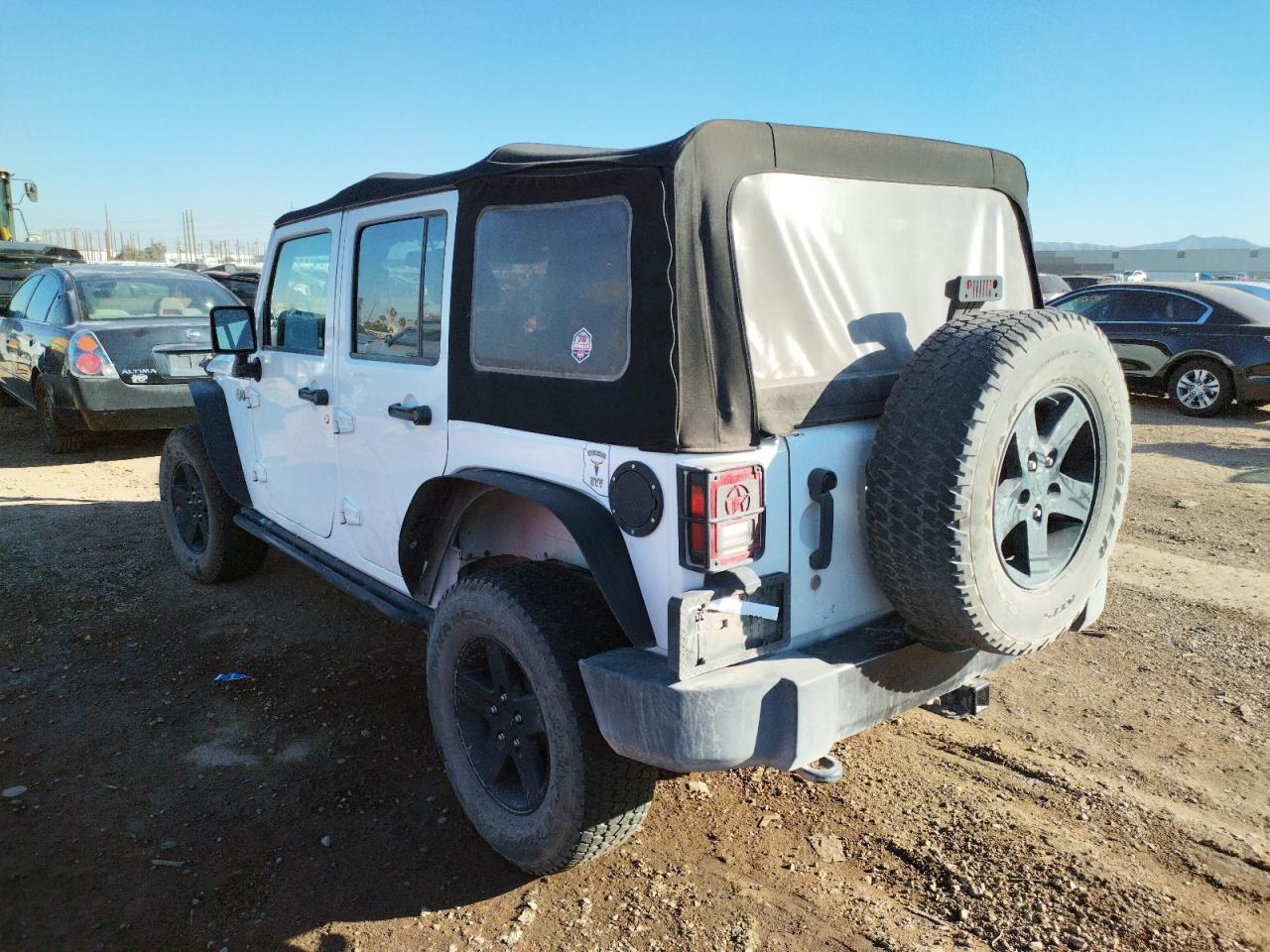 Photo 3 from auction – 2016 JEEP WRANGLER U with VIN 1C4BJWDG7GL109385