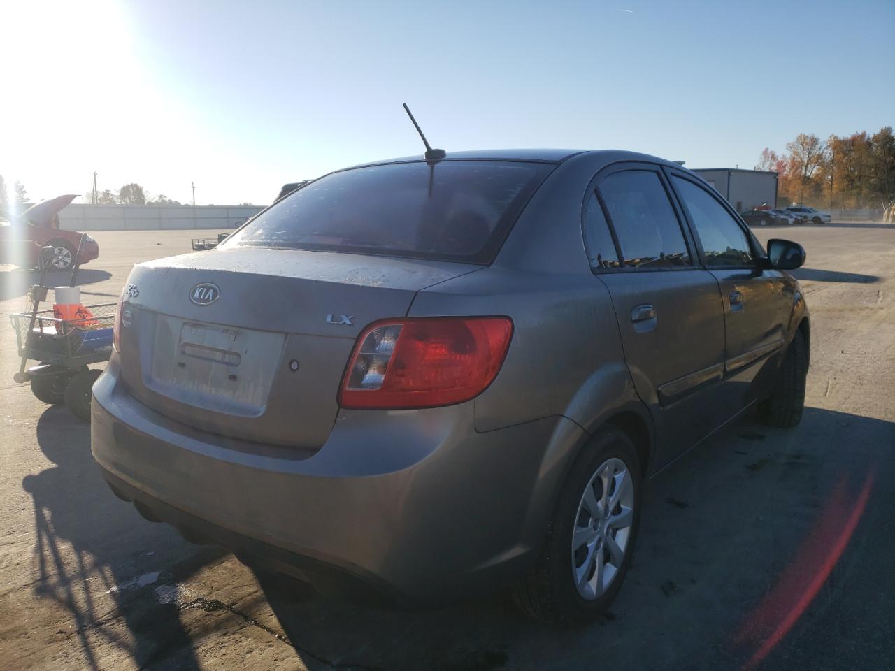 Photo 4 from auction – 2011 KIA RIO BASE with VIN KNADH4A3XB6930849