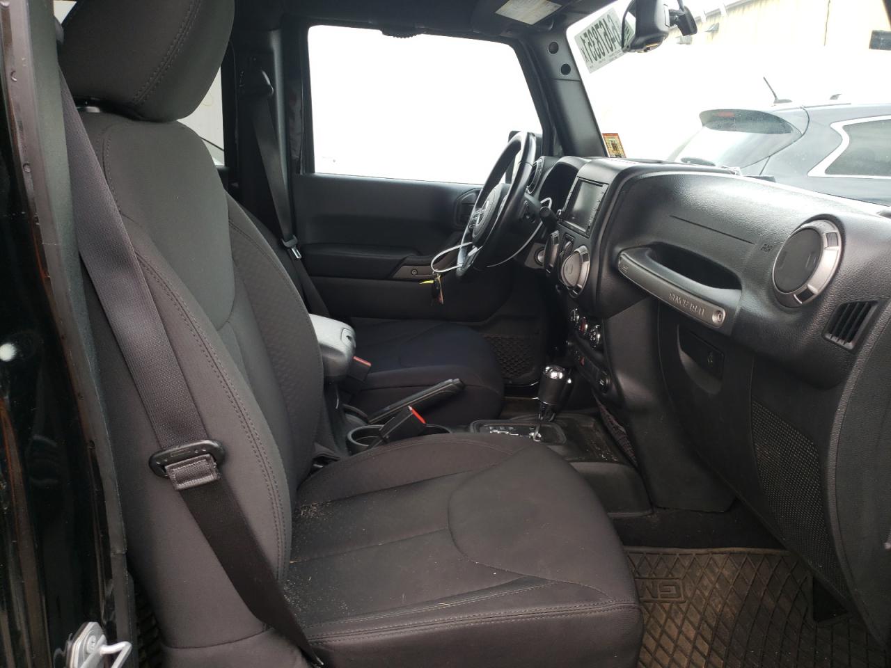 Photo 5 from auction – 2016 JEEP WRANGLER U with VIN 1C4BJWDG0GL347904
