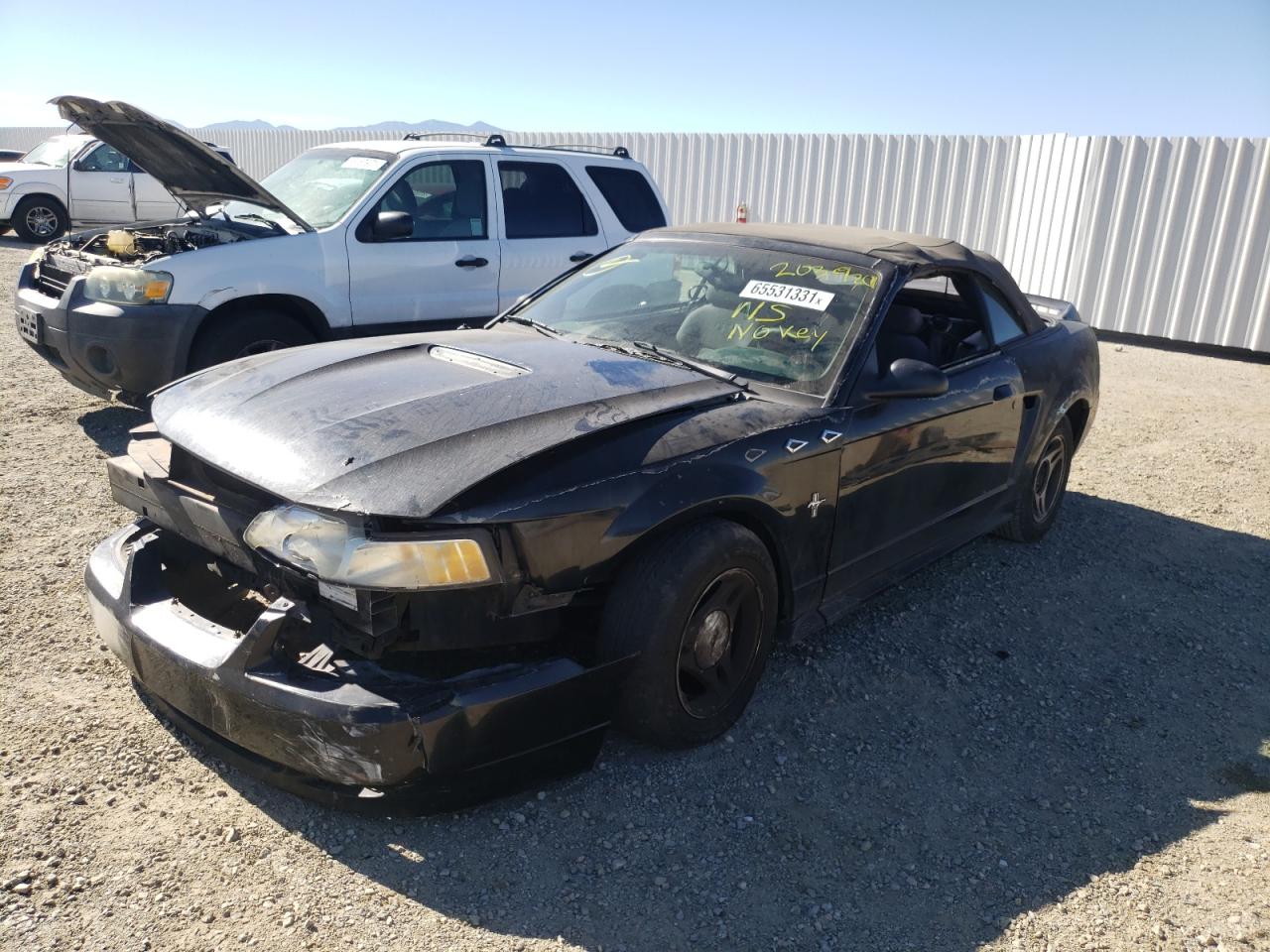 Photo 2 from auction – 2000 FORD MUSTANG with VIN 1FAFP4442YF109908
