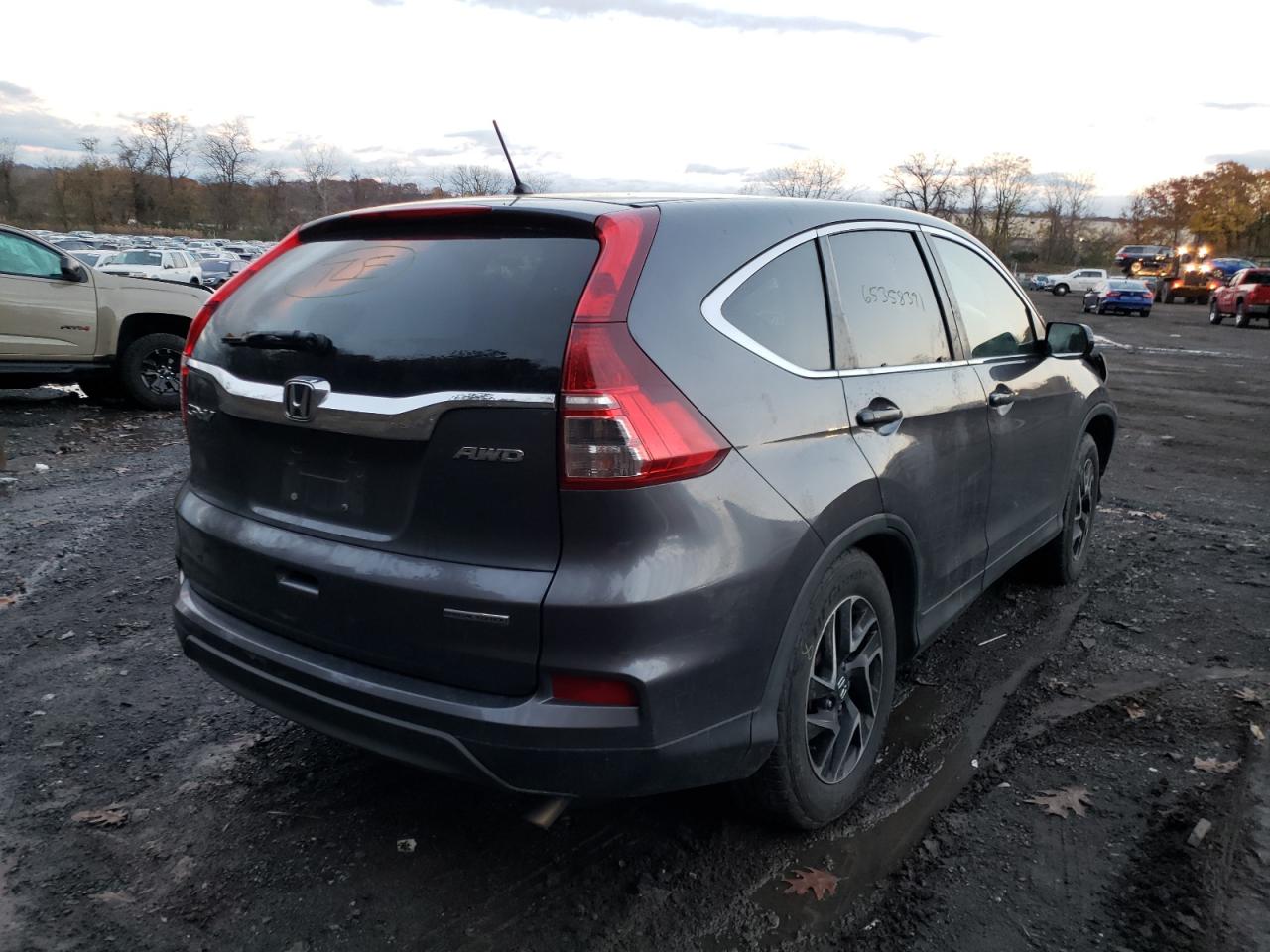 Photo 4 from auction – 2016 HONDA CR-V SE with VIN 2HKRM4H4XGH697913