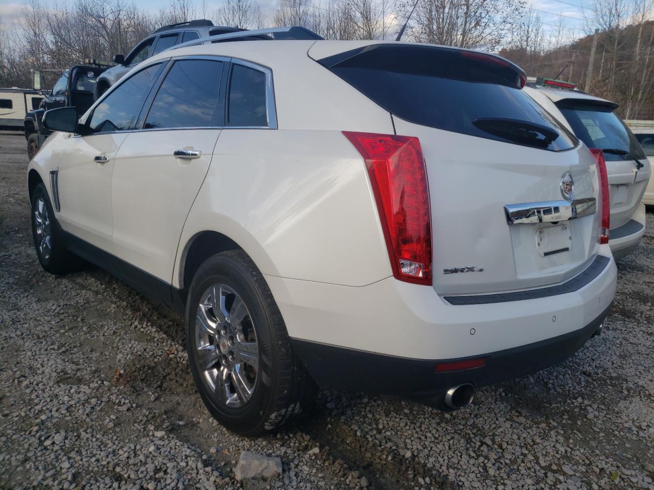 Photo 3 from auction – 2014 CADILLAC SRX LUXURY with VIN 3GYFNEE38ES677691