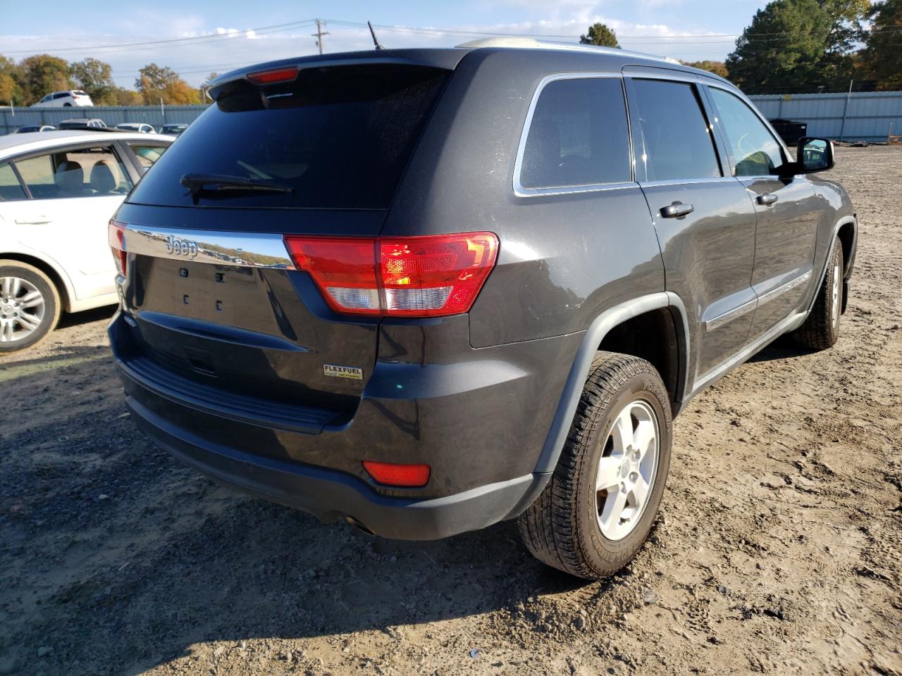 Photo 4 from auction – 2011 JEEP GRAND CHER with VIN 1J4RS4GG5BC658436