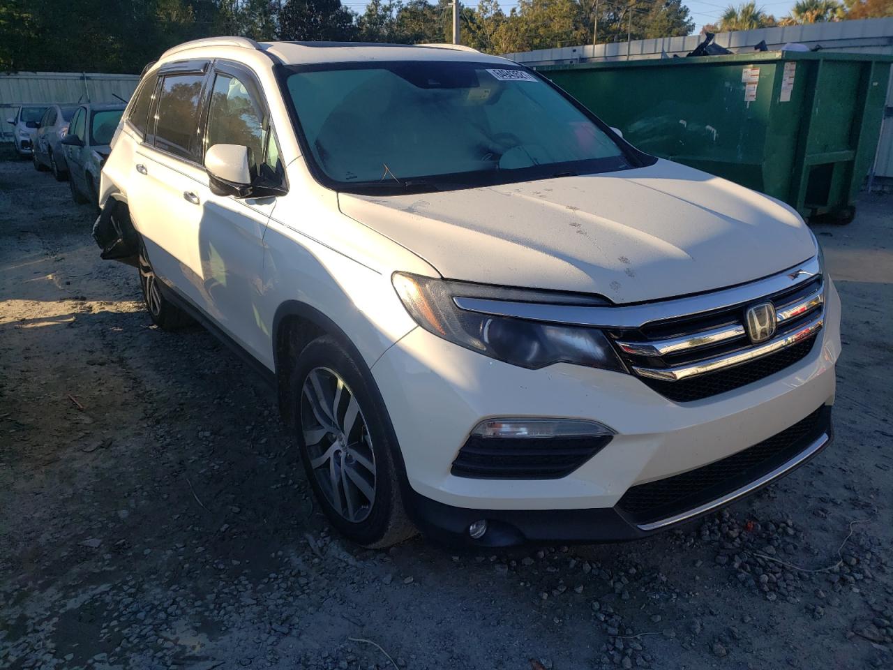 HONDA PILOT TOUR 2017 with VIN 5FNYF6H92HB095889 - Photo from auction