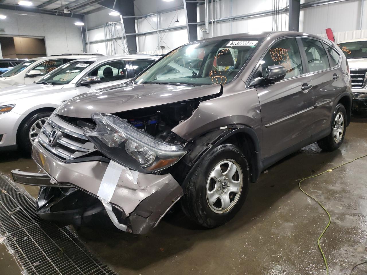Photo 2 from auction – 2014 HONDA CR-V LX with VIN 5J6RM4H34EL072000