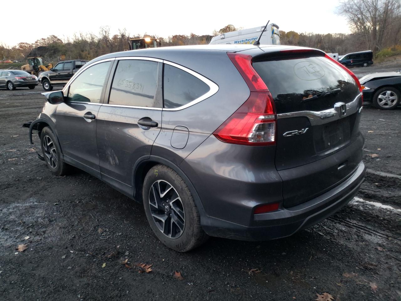 Photo 3 from auction – 2016 HONDA CR-V SE with VIN 2HKRM4H4XGH697913