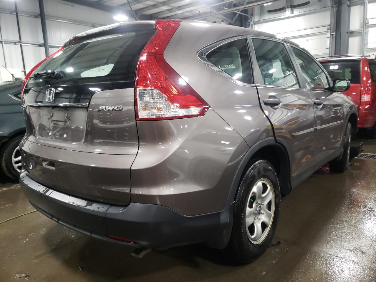 Photo 4 from auction – 2014 HONDA CR-V LX with VIN 5J6RM4H34EL072000
