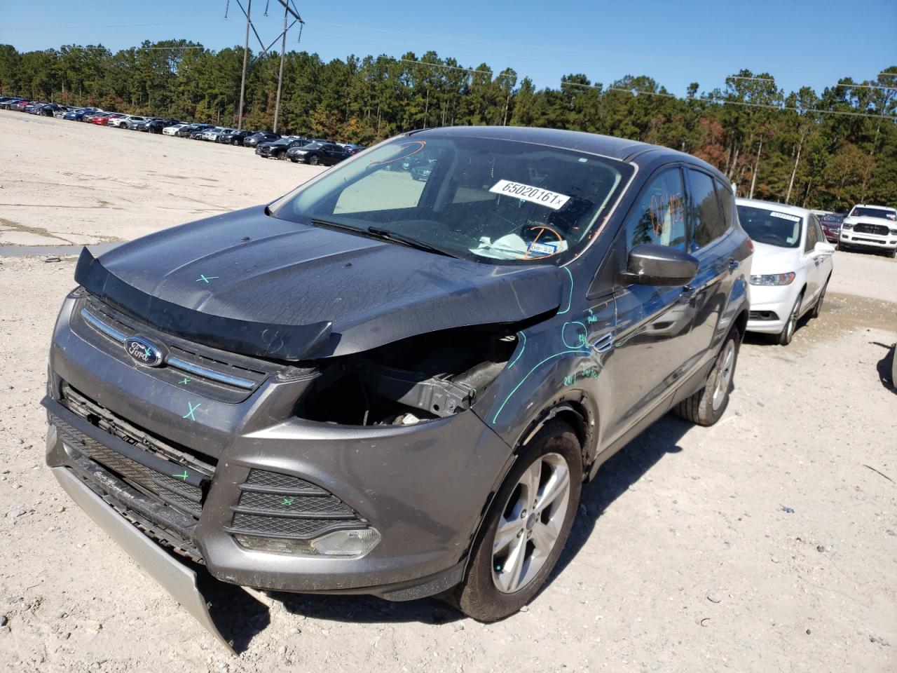 Photo 2 from auction – 2014 FORD ESCAPE SE with VIN 1FMCU0GX2EUD77395