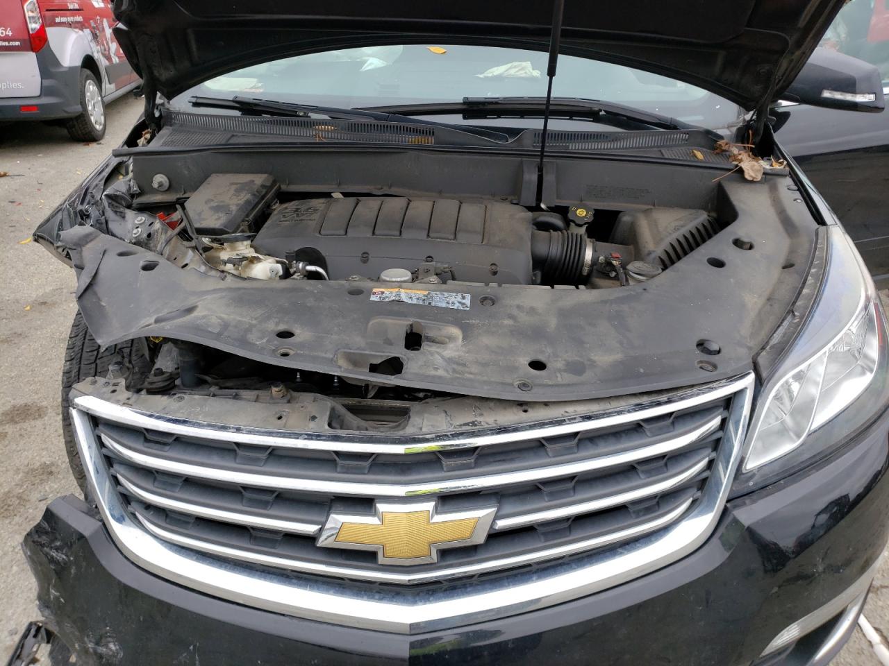 Photo 7 from auction – 2017 CHEVROLET TRAVERSE L with VIN 1GNKRGKD3HJ159745