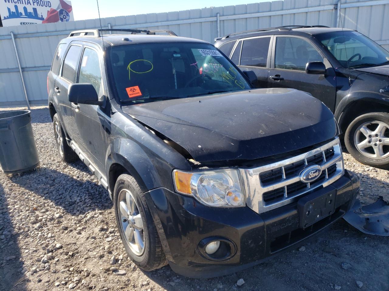 FORD ESCAPE XLT 2011 with VIN 1FMCU0DG5BKC63032 - Photo from auction