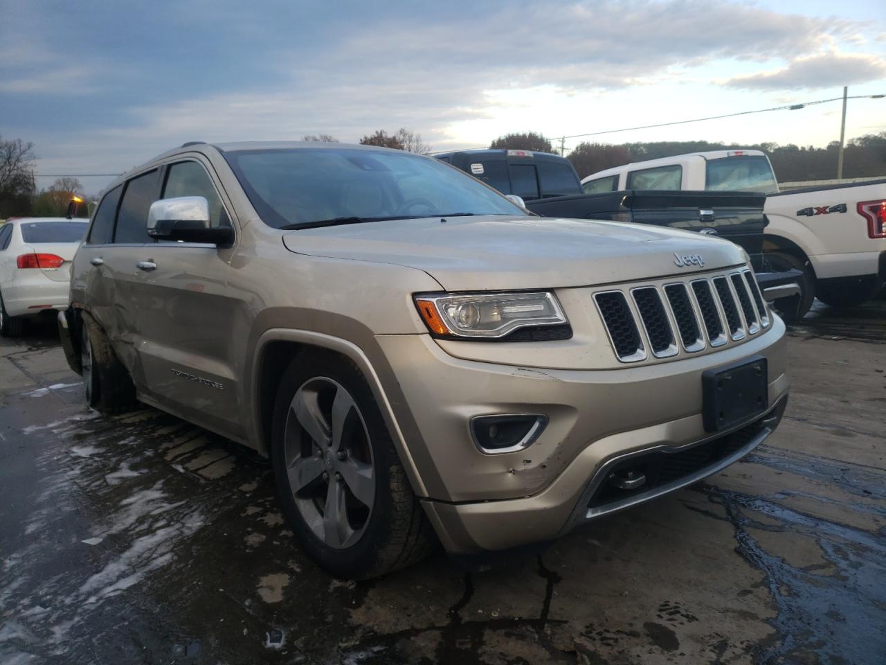 JEEP GRAND CHER 2014 with VIN 1C4RJFCG6EC398711 - Photo from auction