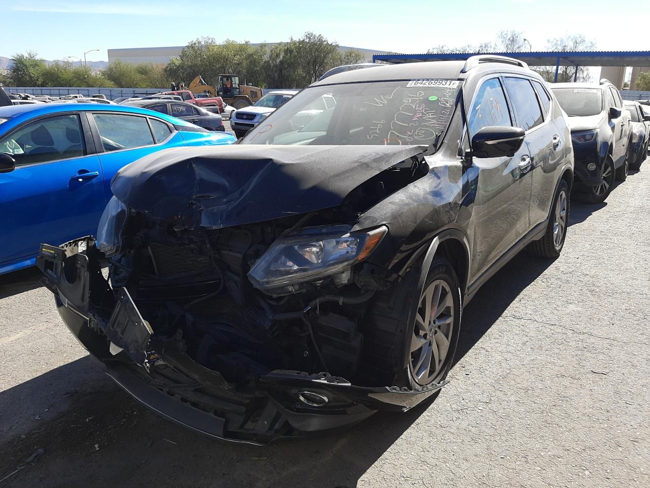 Photo 2 from auction – 2015 NISSAN ROGUE S with VIN 5N1AT2MT9FC772429