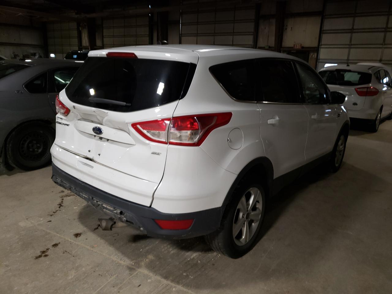Photo 4 from auction – 2014 FORD ESCAPE SE with VIN 1FMCU9GX2EUC44754