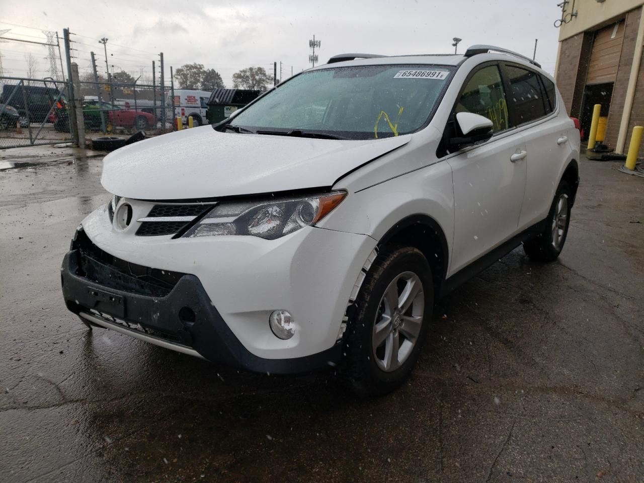 Photo 2 from auction – 2013 TOYOTA RAV4 XLE with VIN JTMRFREVXDD022892