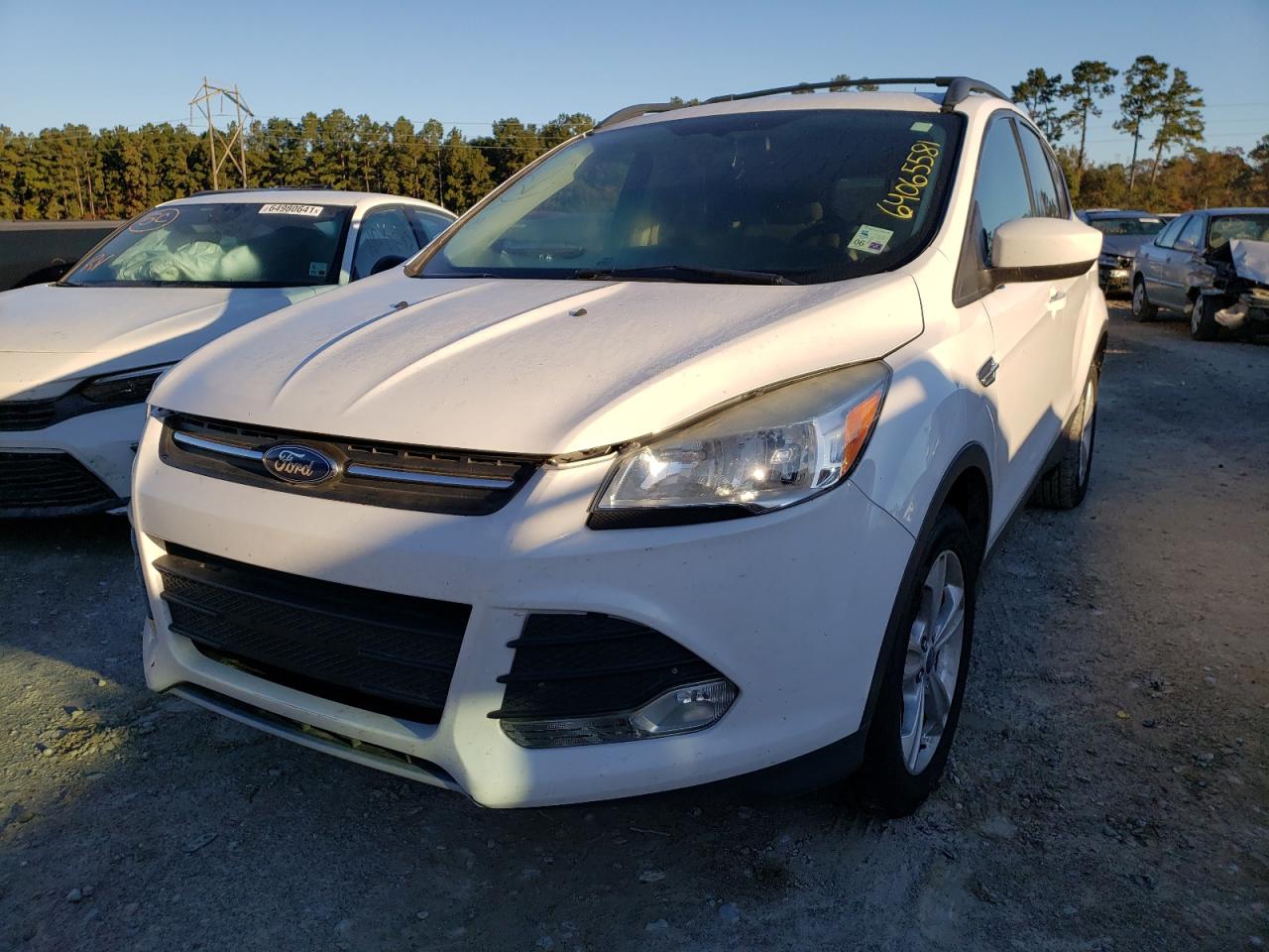 Photo 2 from auction – 2013 FORD ESCAPE SE with VIN 1FMCU0GX3DUC85694