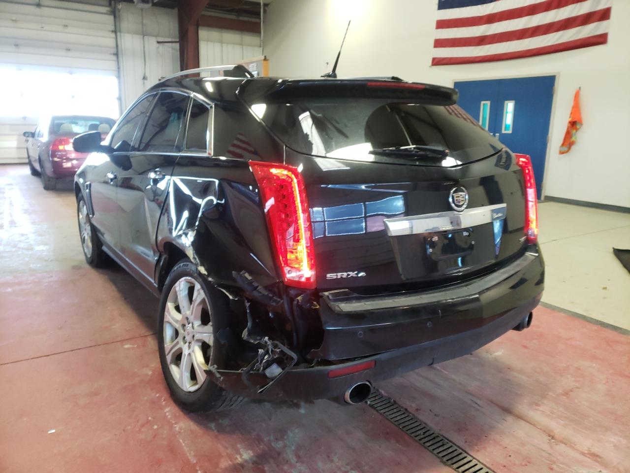 Photo 3 from auction – 2013 CADILLAC SRX with VIN 3GYFNJE30DS653506