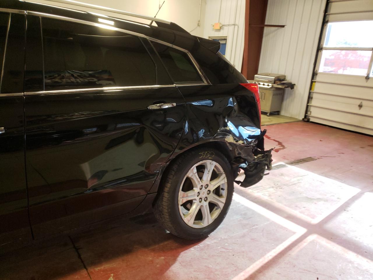 Photo 9 from auction – 2013 CADILLAC SRX with VIN 3GYFNJE30DS653506