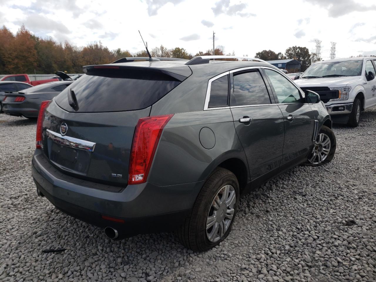 Photo 4 from auction – 2013 CADILLAC SRX LUXURY with VIN 3GYFNCE35DS572030