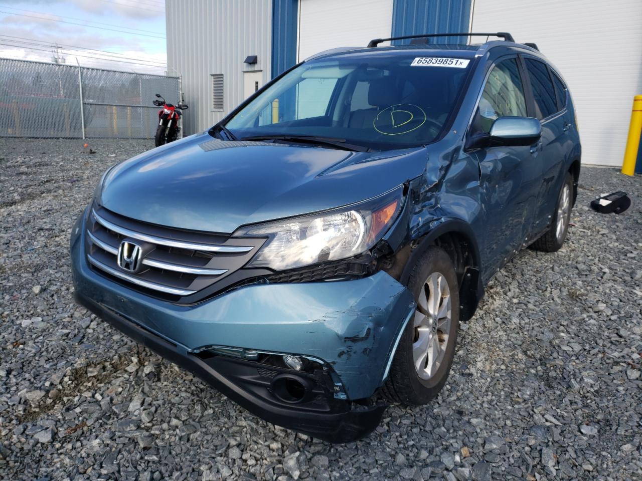 Photo 2 from auction – 2014 HONDA CR-V EX with VIN 2HKRM4H57EH119757