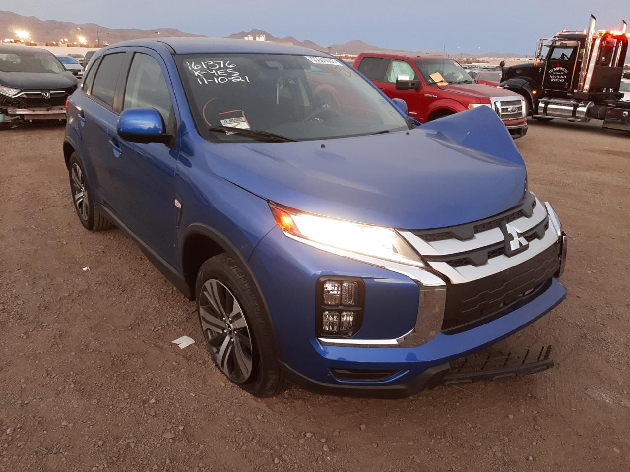MITSUBISHI OUTLANDER 2021 with VIN JA4APUAU0MU010674 - Photo from auction