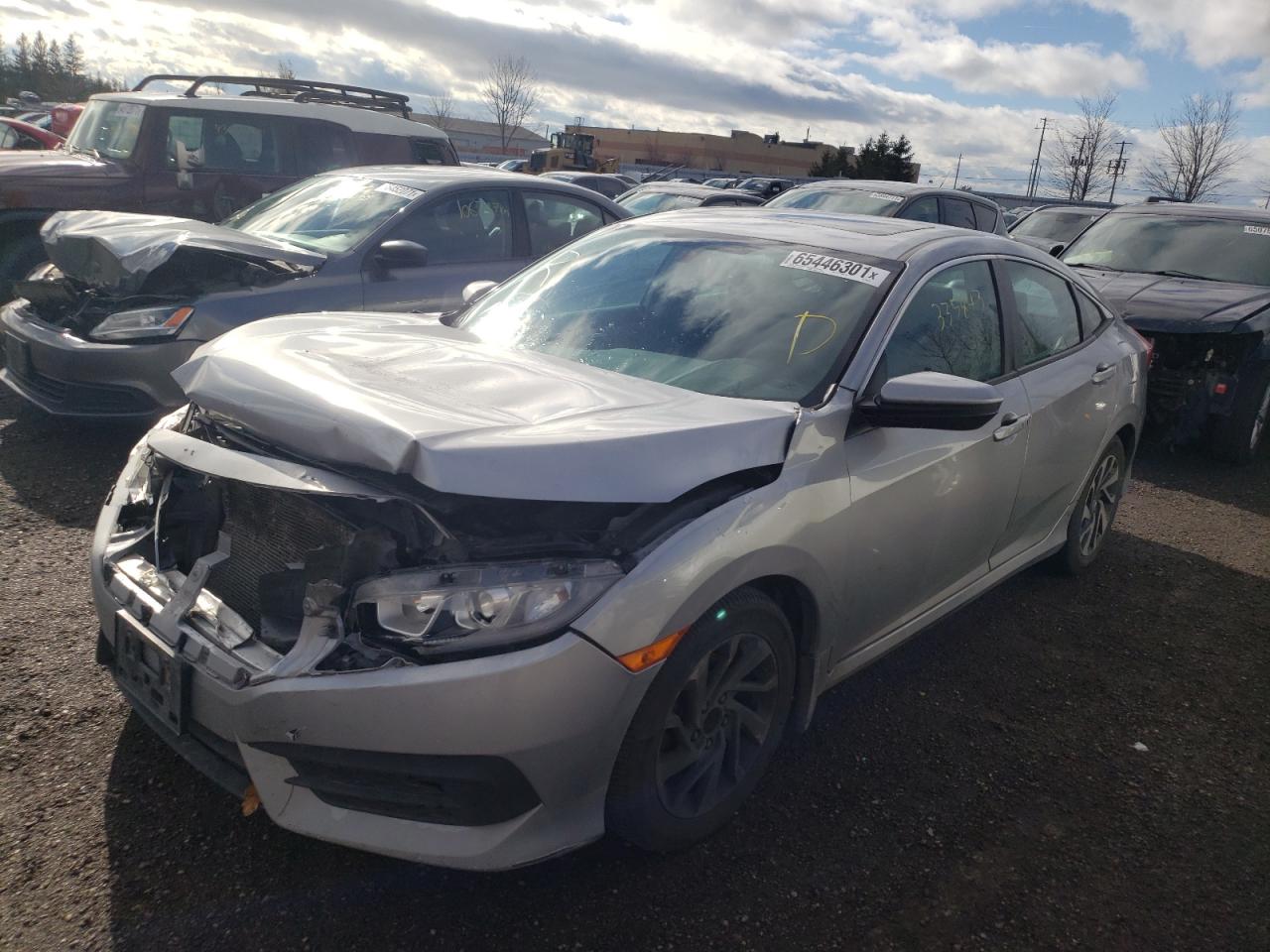 Photo 2 from auction – 2016 HONDA CIVIC EX with VIN 2HGFC2F72GH006570