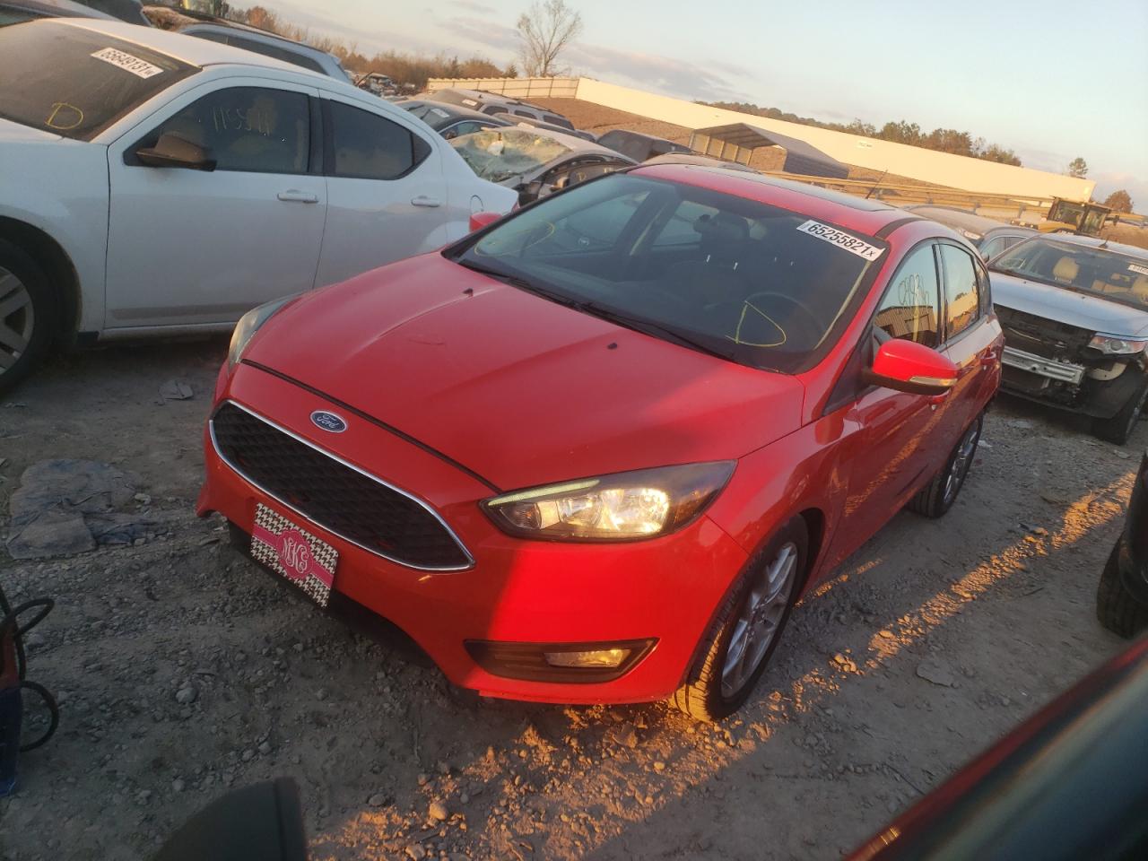 Photo 2 from auction – 2015 FORD FOCUS SE with VIN 1FADP3K23FL302859
