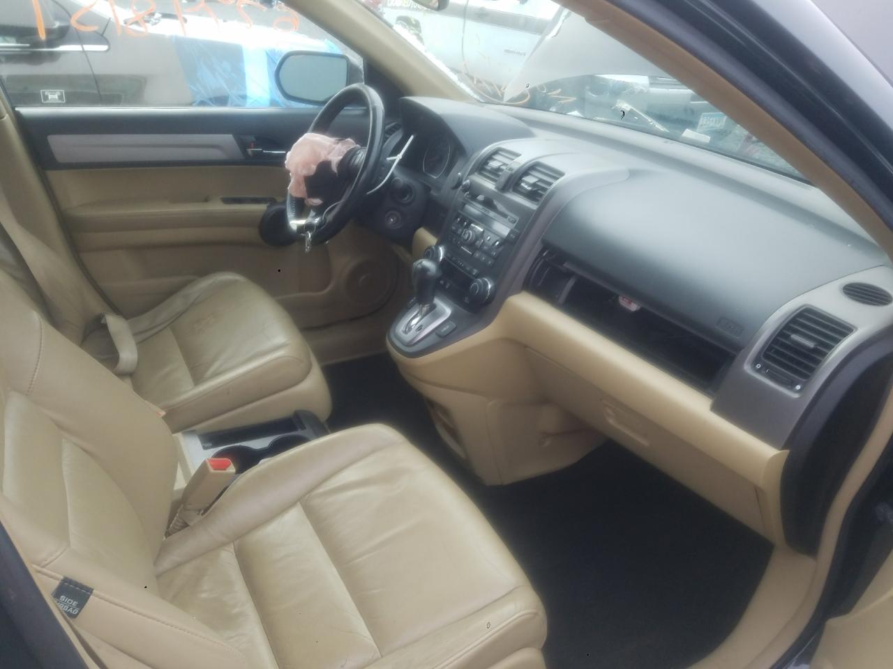 Photo 5 from auction – 2011 HONDA CR-V EXL with VIN 5J6RE4H75BL041799